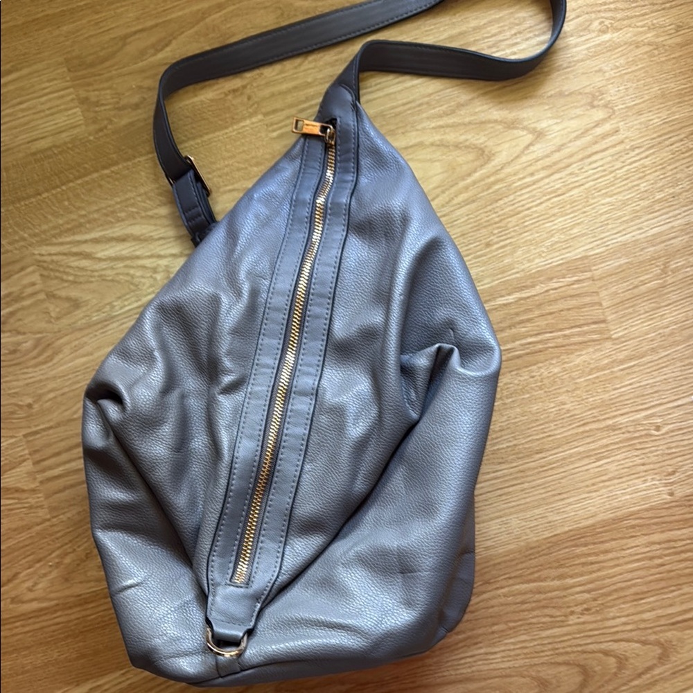Gray Leather Sling Bag with Gold Zipper